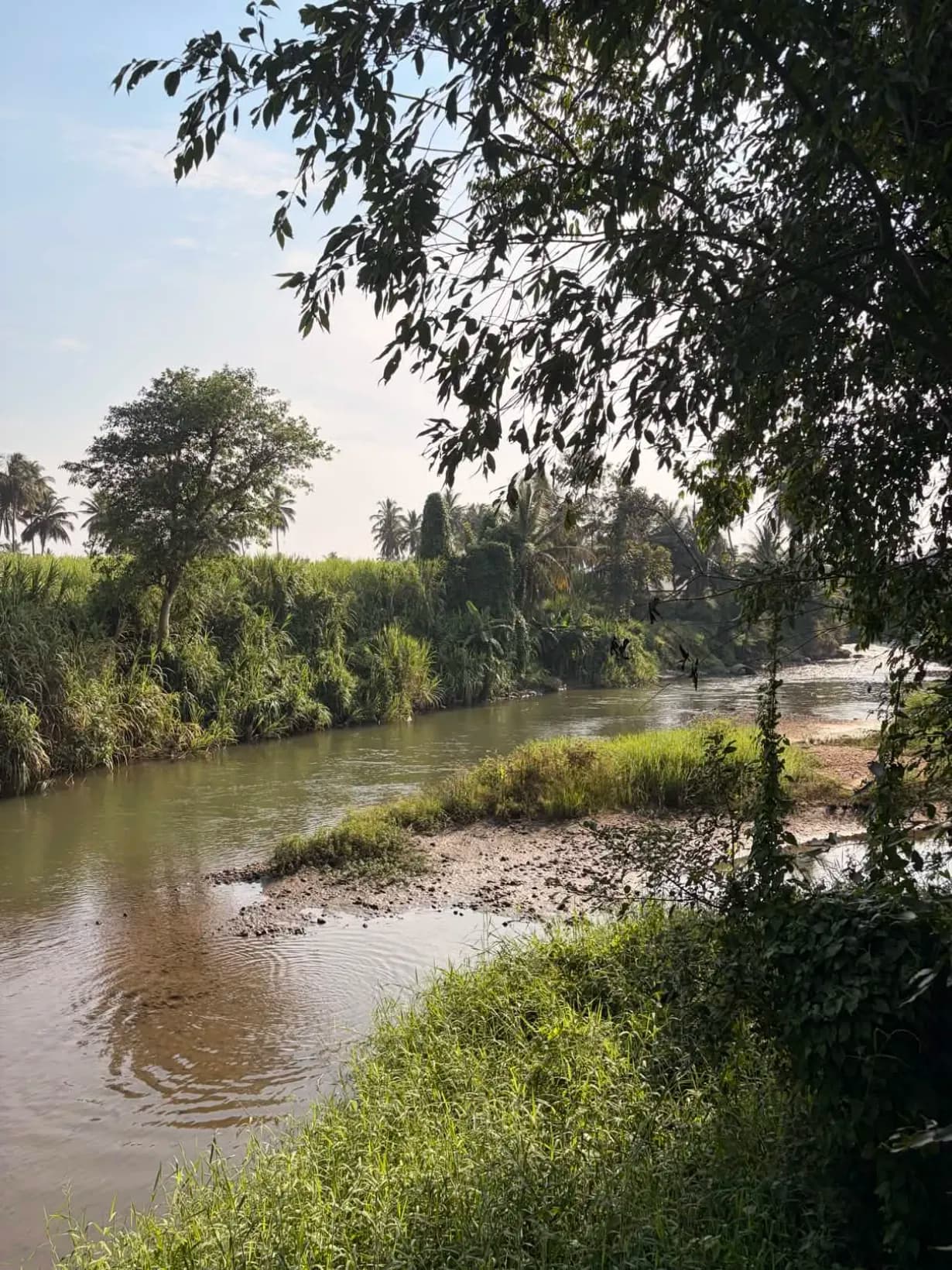 Serene riverside setting at Lokavana